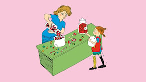 Pippi går i affärer. Pippi står i en godisaffär och pekar på vilka karameller hon vill ha. © Ingrid Vang Nyman/Astrid Lindgren AB